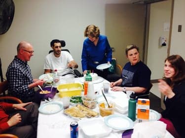 Adil celebrating his birthday during inpatient rehabilitation at Magee Hospital with his care team